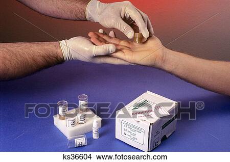 1990S Hands Performing A Gunshot Residue Testing Procedure View Large Photo Image Picture - 1990S Hands Performing A Gunshot Residue Testing Procedure. Fotosearch