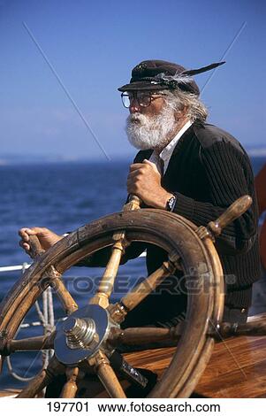 1990S Mature Bearded Man At Wheel Of Ship View Large Photo Image Stock Image - 1990S Mature Bearded Man At Wheel Of Ship. Fotosearch