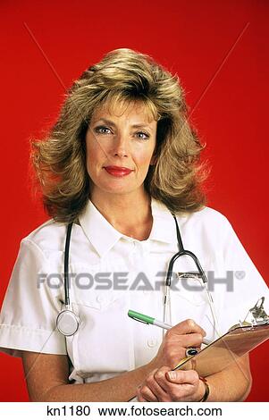 1990S Portrait Of Nurse With Stethoscope And Clipboard View Large Photo Image Stock Image - 1990S Portrait Of Nurse With Stethoscope And Clipboard . Fotosearch