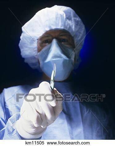 Close Up Of Surgeon With Scalpel Looking At Camera View Large Photo Image Stock Photography - Close Up Of Surgeon With Scalpel Looking At Camera. Fotosearch