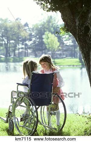 Girl In Wheelchair With Friend View Large Photo Image Stock Photography - Girl In Wheelchair With Friend . Fotosearch