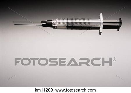 Stock Photo - Plastic Syringe . Fotosearch