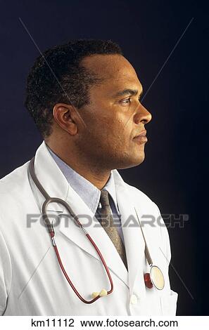 Profile Portrait Of African-American Doctor With Stethoscope Around His Neck View Large Photo Image Stock Image - Profile Portrait Of African-American Doctor With Stethoscope Around His Neck . Fotosearch