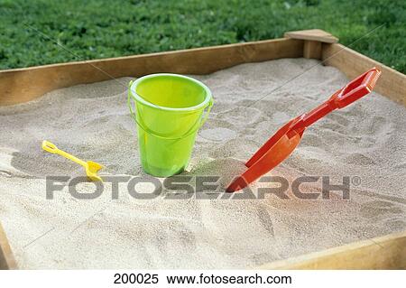 Sandbox With Pail And Shovel View Large Photo Image Stock Photography - Sandbox With Pail And Shovel . Fotosearch