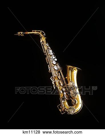 Single Saxophone Against Black Background View Large Photo Image Stock Photo - Single Saxophone Against Black Background . Fotosearch