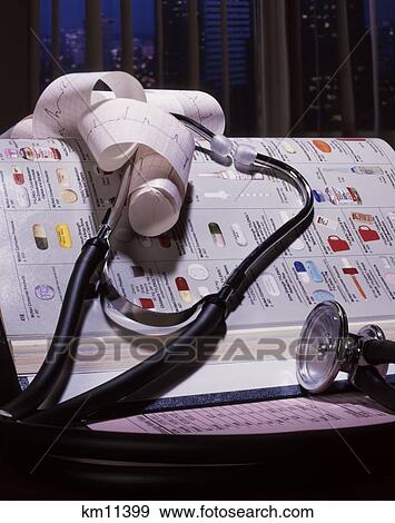 Stethoscope With Ekg Printout And Physician'S Desk Reference View Large Photo Image Stock Photo - Stethoscope With Ekg Printout And Physician'S Desk Reference . Fotosearch