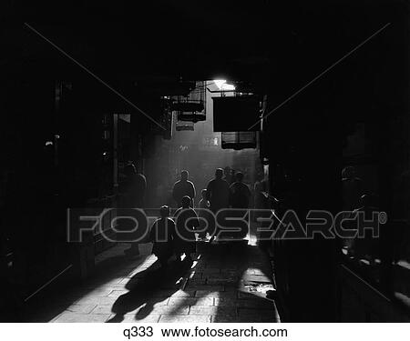 1920S 1930S Silhouetted People Mysterious Orient Dramatic Moody Backlit Street Scene In Old Chinese City Shanghai China View Large Photo Image Stock Image - 1920S 1930S Silhouetted People Mysterious Orient Dramatic Moody Backlit Street Scene In Old Chinese City Shanghai China. Fotosearch