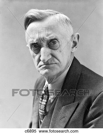 Stock Photography - 1930S Portrait Of Frowning Elderly Man Looking At Camera. Fotosearch