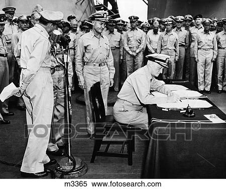 Stock Photography - 1940S 1945 Admiral Nimitz Signs Japanese Surrender Documents Aboard Uss Missouri Tokyo Bay August 31 1945. Fotosearch