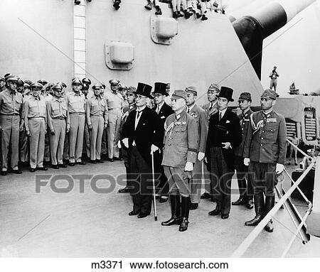 Stock Image - 1940S Japanese Surrender Treaty Signers Signatories Onboard Uss Missouri Tokyo Bay August 31 1945. Fotosearch