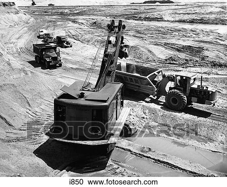 1950S Construction Site Excavation Gravel Pit Crane Trucks Bulldozer Cars View Large Photo Image Stock Image - 1950S Construction Site Excavation Gravel Pit Crane Trucks Bulldozer Cars. Fotosearch