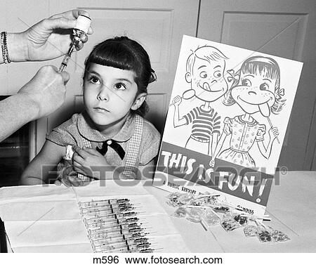 1950S Little Girl Looking Up About To Get Polio Vaccination At School Sign This Is Fun With Lollipops View Large Photo Image Stock Photograph - 1950S Little Girl Looking Up About To Get Polio Vaccination At School Sign This Is Fun With Lollipops. Fotosearch