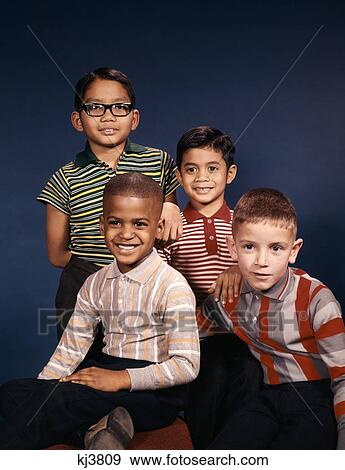 1960 Portrait Four Smiling Mixed Ethnic Boys Asian African American Hispanic And Caucasian View Large Photo Image Stock Photo - 1960 Portrait Four Smiling Mixed Ethnic Boys Asian African American Hispanic And Caucasian . Fotosearch