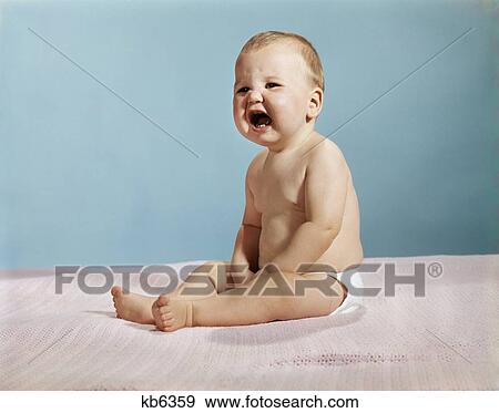 1960S 1970S Sitting Baby Crying Angry View Large Photo Image Stock Photo - 1960S 1970S Sitting Baby Crying Angry. Fotosearch
