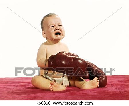 1960S Crying Baby Wearing Boxing Gloves View Large Photo Image Stock Image - 1960S Crying Baby Wearing Boxing Gloves. Fotosearch