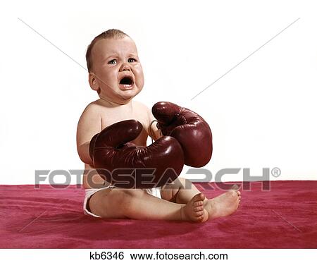 1960S Crying Baby Wearing Boxing Gloves View Large Photo Image Stock Photograph - 1960S Crying Baby Wearing Boxing Gloves. Fotosearch