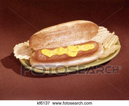 1960S Hot Dog On Toasted Bun Mustard And Chips View Large Photo Image Stock Photo - 1960S Hot Dog On Toasted Bun Mustard And Chips. Fotosearch