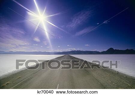 1980S Clear And Dry Winter Highway Stretching On To Infinity Under Glaring Sun View Large Photo Image Stock Image - 1980S Clear And Dry Winter Highway Stretching On To Infinity Under Glaring Sun. Fotosearch