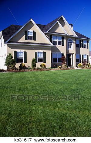 House With Peaked Roof And Lush Green Lawn View Large Photo Image Stock Photo - House With Peaked Roof And Lush Green Lawn. Fotosearch