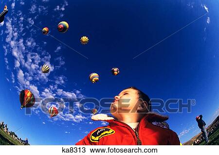 Little Boy Looking Up At Hot Air Balloons Reno Nevada Usa View Large Photo Image Stock Image - Little Boy Looking Up At Hot Air Balloons Reno Nevada Usa. Fotosearch
