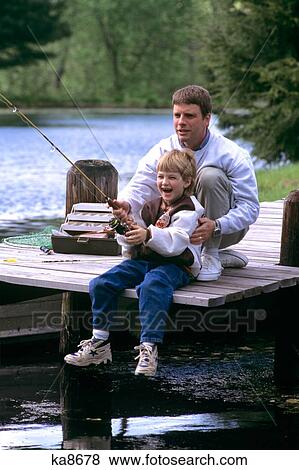 Man And Boy Father And Son Fishing On Dock View Large Photo Image Stock Photo - Man And Boy Father And Son Fishing On Dock. Fotosearch