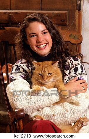 Smiling Young Woman With Red Tabby Cat View Large Photo Image Stock Image - Smiling Young Woman With Red Tabby Cat. Fotosearch