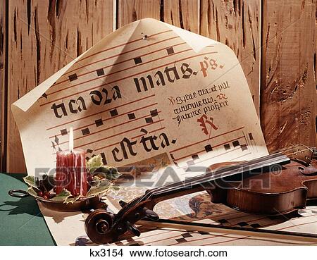 Still Life Christmas Candle Violin Old Manuscript Latin Verse Music Sheet View Large Photo Image Picture - Still Life Christmas Candle Violin Old Manuscript Latin Verse Music Sheet . Fotosearch