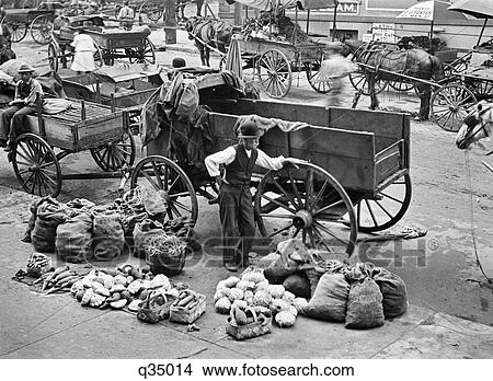 1910 Marketplace In Kansas City Mo With Horse Carts & Vendors Selling Vegetables View Large Photo Image Picture - 1910 Marketplace In Kansas City Mo With Horse Carts & Vendors Selling Vegetables. Fotosearch