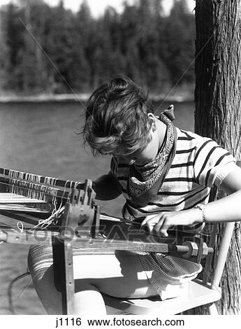 1930S Girl At Summer Camp By Lake Learning To Weave On Craft Project Loom View Large Photo Image Stock Photograph - 1930S Girl At Summer Camp By Lake Learning To Weave On Craft Project Loom. Fotosearch