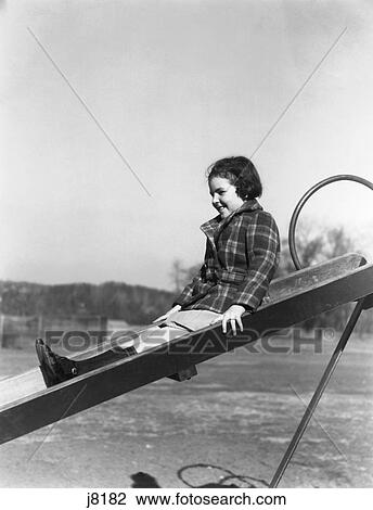 1930S Smiling Brunette Girl Autumn Going Down Playground Slide Sliding Board View Large Photo Image Stock Image - 1930S Smiling Brunette Girl Autumn Going Down Playground Slide Sliding Board. Fotosearch