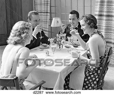 Stock Photo - 1930S Two Couples Formal Dinner Party. Fotosearch