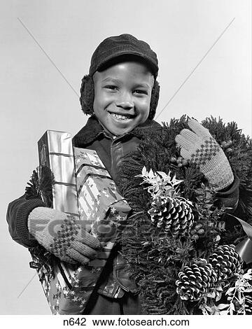 1940S African American Boy Christmas Presents Wreath View Large Photo Image Stock Image - 1940S African American Boy Christmas Presents Wreath. Fotosearch
