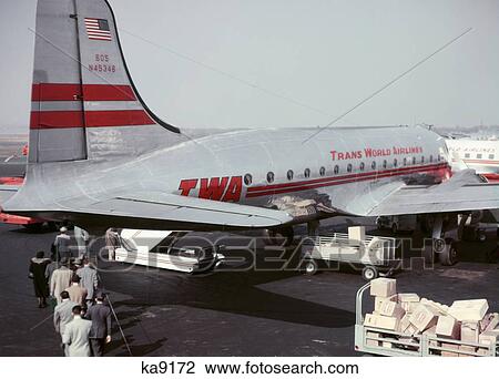 1950S Anonymous Passengers And Cargo On Tarmac Boarding Trans World Airlines Twa Plane Laguardia Airport New York Usa View Large Photo Image Stock Image - 1950S Anonymous Passengers And Cargo On Tarmac Boarding Trans World Airlines Twa Plane Laguardia Airport New York Usa. Fotosearch