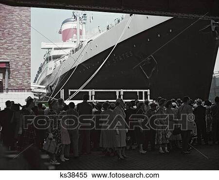 1950S Cruise Ship The United States Just Before Sailing From New York Pier Crowd Waiting To Bid Bon Voyage New York City Usa View Large Photo Image Stock Photography - 1950S Cruise Ship The United States Just Before Sailing From New York Pier Crowd Waiting To Bid Bon Voyage New York City Usa. Fotosearch