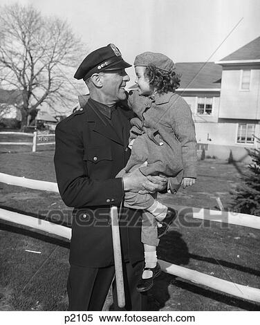 1950S Policeman Carrying Young Girl View Large Photo Image Stock Photography - 1950S Policeman Carrying Young Girl. Fotosearch