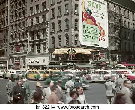 1950S Traffic & Pedestrians Intersection Fifth Avenue 42Nd Street Midtown With Large Billboard Savings Bank Ads New York Usa View Large Photo Image Picture - 1950S Traffic & Pedestrians Intersection Fifth Avenue 42Nd Street Midtown With Large Billboard Savings Bank Ads New York Usa. Fotosearch