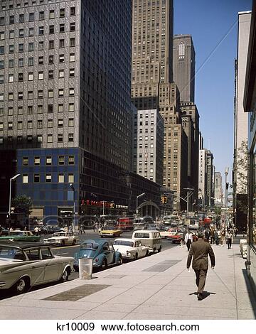 1960S Pedestrians And Street Traffic 42Nd Street And Third Avenue Midtown Manhattan New York City Usa View Large Photo Image Stock Photo - 1960S Pedestrians And Street Traffic 42Nd Street And Third Avenue Midtown Manhattan New York City Usa . Fotosearch