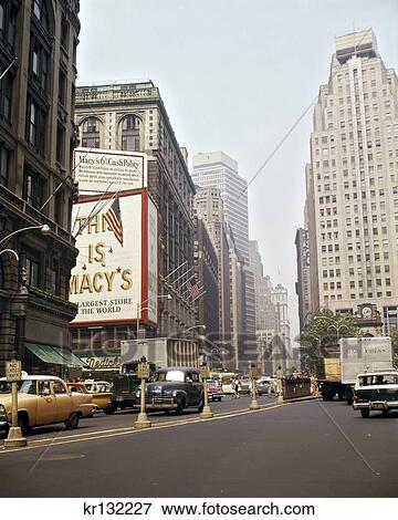 1960S Traffic Cars Trucks Taxis On Broadway At Herald Square And Macy'S Department Store Manhattan New York City Usa View Large Photo Image Stock Photo - 1960S Traffic Cars Trucks Taxis On Broadway At Herald Square And Macy'S Department Store Manhattan New York City Usa. Fotosearch