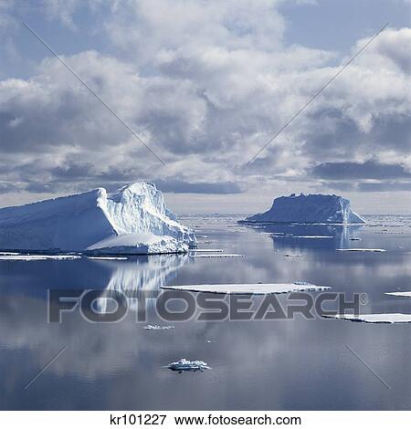 Two Large Icebergs And Floating Ice In Antarctic View Large Photo Image Stock Photo - Two Large Icebergs And Floating Ice In Antarctic. Fotosearch