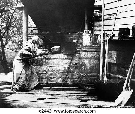 1880s WOMAN IN BONNET USING PEEL TO TAKE BREAD OUT OF OUTDOOR BRICK OVEN View Large Photo Image Stock Image - 1880s WOMAN IN BONNET USING PEEL TO TAKE BREAD OUT OF OUTDOOR BRICK OVEN. Fotosearch