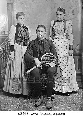 1890S Portrait Two Women One Man Posing With Tennis Racquets View Large Photo Image Stock Image - 1890S Portrait Two Women One Man Posing With Tennis Racquets . Fotosearch