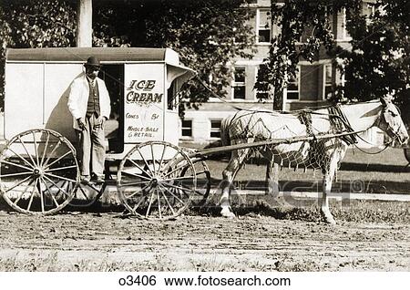 1890s TURN OF THE 20TH CENTURY ICE CREAM DELIVERY MAN STANDING ON SIDE OF HORSE DRAWN WAGON LOOKING AT CAMERA View Large Photo Image Stock Photograph - 1890s TURN OF THE 20TH CENTURY ICE CREAM DELIVERY MAN STANDING ON SIDE OF HORSE DRAWN WAGON LOOKING AT CAMERA. Fotosearch