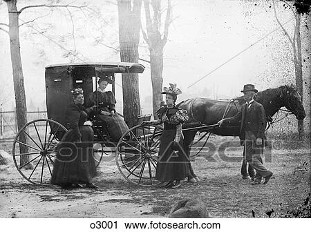1890s WOMAN SITTING IN HORSE DRAWN CARRIAGE TWO WOMEN AND ONE MAN STANDING BY CARRIAGE View Large Photo Image Stock Image - 1890s WOMAN SITTING IN HORSE DRAWN CARRIAGE TWO WOMEN AND ONE MAN STANDING BY CARRIAGE. Fotosearch