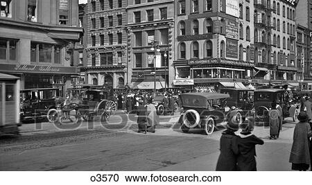 1910s FIFTH AVENUE & 46th STREET TRAFFIC SHOPS PEDESTRIANS SHOPPERS CARS HORSE & WAGONS BUSY INTERSECTION NYC USA View Large Photo Image Stock Image - 1910s FIFTH AVENUE & 46th STREET TRAFFIC SHOPS PEDESTRIANS SHOPPERS CARS HORSE & WAGONS BUSY INTERSECTION NYC USA. Fotosearch
