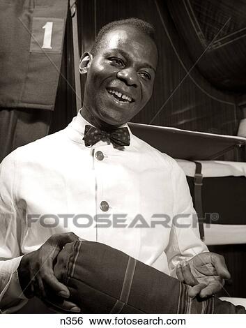 1920s 1930s 1940s SMILING AFRICAN AMERICAN MAN PORTER ON PULLMAN CAR ON PASSENGER RAILROAD TRAIN OVER NIGHT SLEEPING CAR View Large Photo Image Stock Photograph - 1920s 1930s 1940s SMILING AFRICAN AMERICAN MAN PORTER ON PULLMAN CAR ON PASSENGER RAILROAD TRAIN OVER NIGHT SLEEPING CAR. Fotosearch