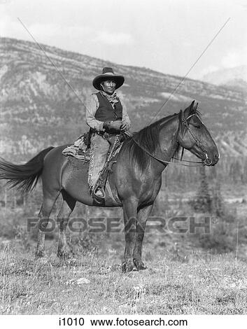 1920S Native American Man On Horseback Wearing Cowboy Clothes Stoney Sioux Alberta Canada View Large Photo Image Stock Image - 1920S Native American Man On Horseback Wearing Cowboy Clothes Stoney Sioux Alberta Canada. Fotosearch