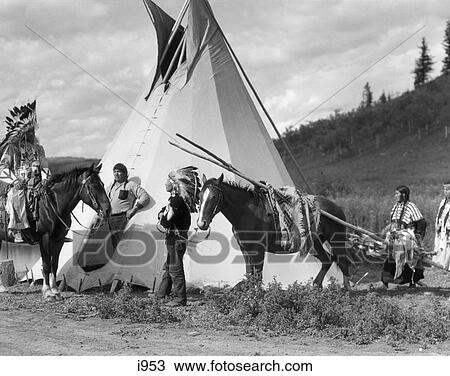 1920S Native American Stoney Sioux Indian Group Men And Women With Horse Pulling Travois By Tepee Alberta Canada View Large Photo Image Stock Image - 1920S Native American Stoney Sioux Indian Group Men And Women With Horse Pulling Travois By Tepee Alberta Canada . Fotosearch