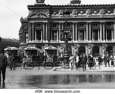 Stock Photograph - 1920S Pedestrians And Busses At Place De La Opera Paris France . Fotosearch