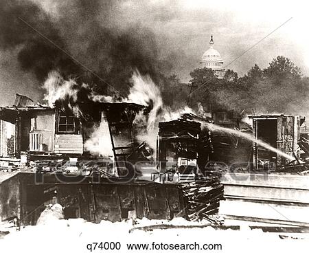 1930s 1932 DESTRUCTION OF BONUS ARMY SHACKS BY FIRE BY UNITED STATES ARMY WASHINGTON DC USA View Large Photo Image Stock Image - 1930s 1932 DESTRUCTION OF BONUS ARMY SHACKS BY FIRE BY UNITED STATES ARMY WASHINGTON DC USA. Fotosearch