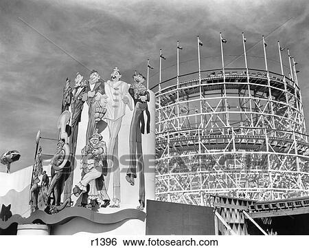 1930s 1939 WORLD'S FAIR CLOWN MURAL AND ROLLER COASTER IN AMUSEMENT AREA NEW YORK CITY NY USA View Large Photo Image Stock Photograph - 1930s 1939 WORLD'S FAIR CLOWN MURAL AND ROLLER COASTER IN AMUSEMENT AREA NEW YORK CITY NY USA. Fotosearch